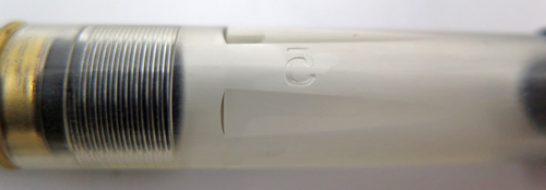 ITEM # 6690: FRONTIER SHOP PROTOTYPE ROLLERBALL IN CLEAR PLASTIC WITH BRUSHED STAINLESS CAP AND GOLD PLATED TRIM. 
